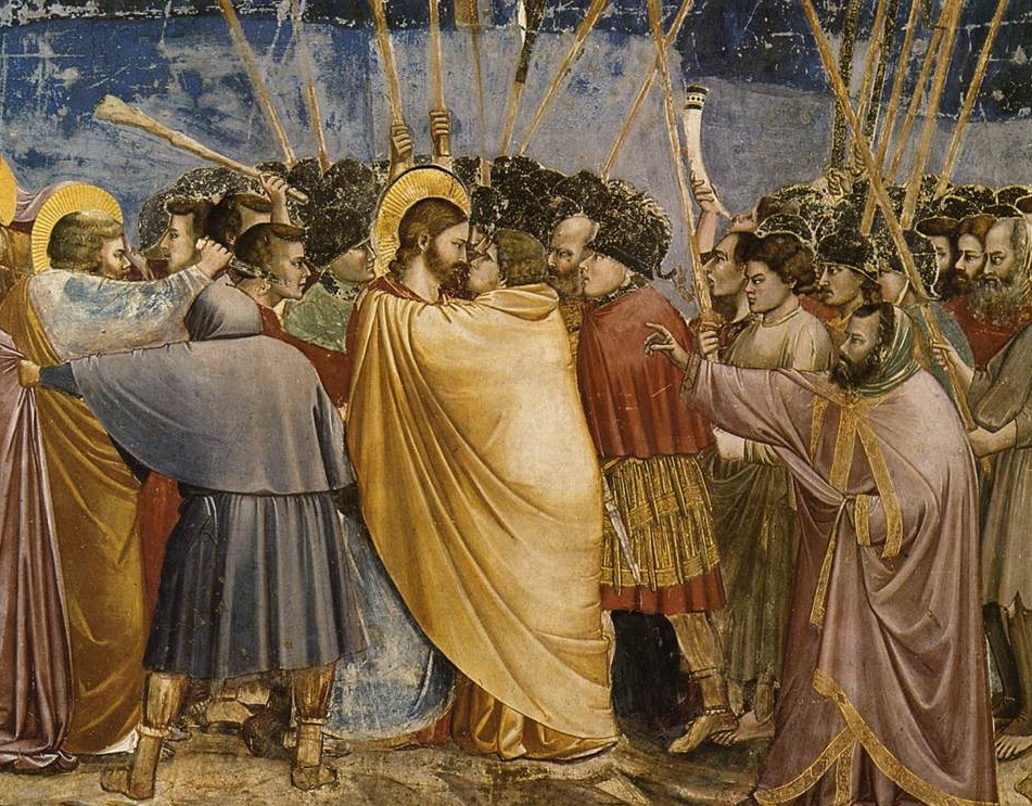Jesús es apresado (1302-6), por el Giotto (1267-1337). Judas besa a Jesús. San Pedro, detrás de él, usa la espada. Fresco en la Capilla de los Scrovegni, en Padua